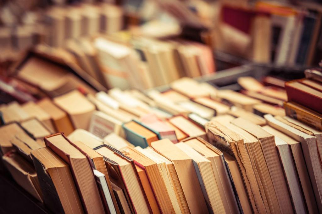 39081393 - many old books in a book shop or library